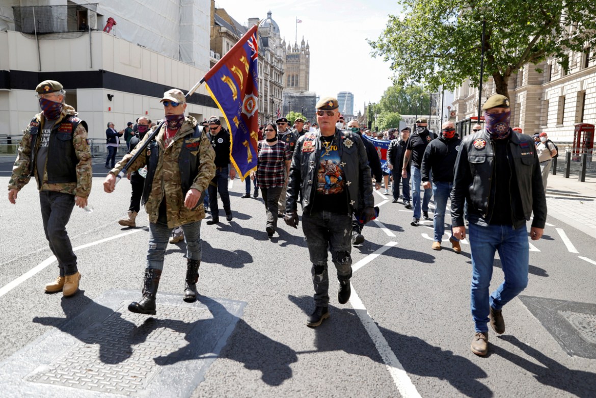 Counter-protesters walk as people gather ahead of a Black Lives Matter protest following the death of George Floyd in Minneapolis police custody, in London, Britain, June 13, 2020. REUTERS/John Sibley