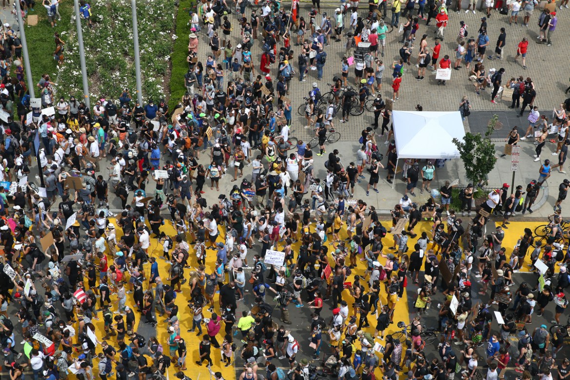 WASHINGTON, DC - JUNE 06: Demonstrators gather on the newly named Black Lives Plaza while protesting peacefully against police brutality and racism on June 6, 2020 in Washington, DC. This is the 12th