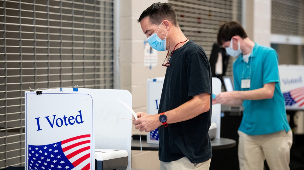 John Sherer looks at his printed ballot at Dreher High School on June 9, 2020 in Columbia, South Carolina. Georgia, Nevada, North Dakota, South Carolina and West Virginia hold primaries today. (Photo 