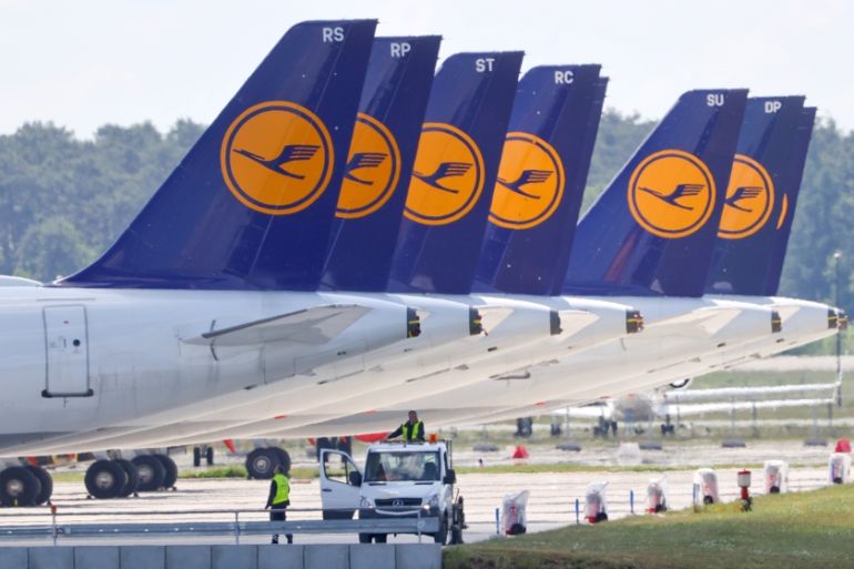 Planes of German airline Lufthansa are parked at the Berlin Schoenefeld airport amid the spread of the coronavirus disease (COVID-19), Schoenefeld, Germany, May 26, 2020. REUTERS/Fabrizio Bensch