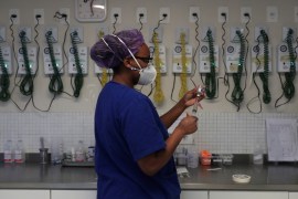 Nurse Jaqueline Borges Dias prepares medications for a patient suffering from the coronavirus disease (COVID-19) at the Intensive Care Unit (ICU) of Emilio Ribas Institute in Sao Paulo, Brazil, June 1