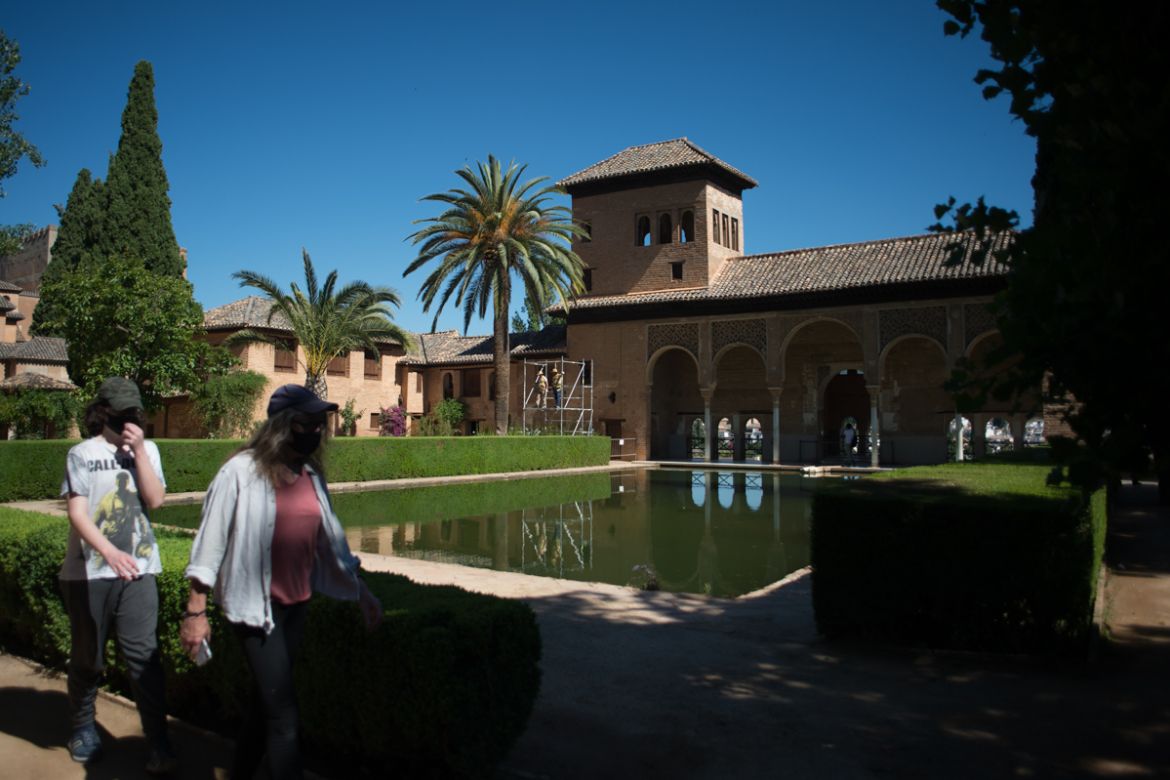 Tourists visit the Alhambra in Granada on June 17, 2020, on the day it reopen to the public after three months of closure due to the coronavirus pandemic. (Photo by JORGE GUERRERO / AFP)