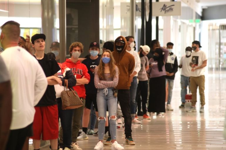Young people in line at mall