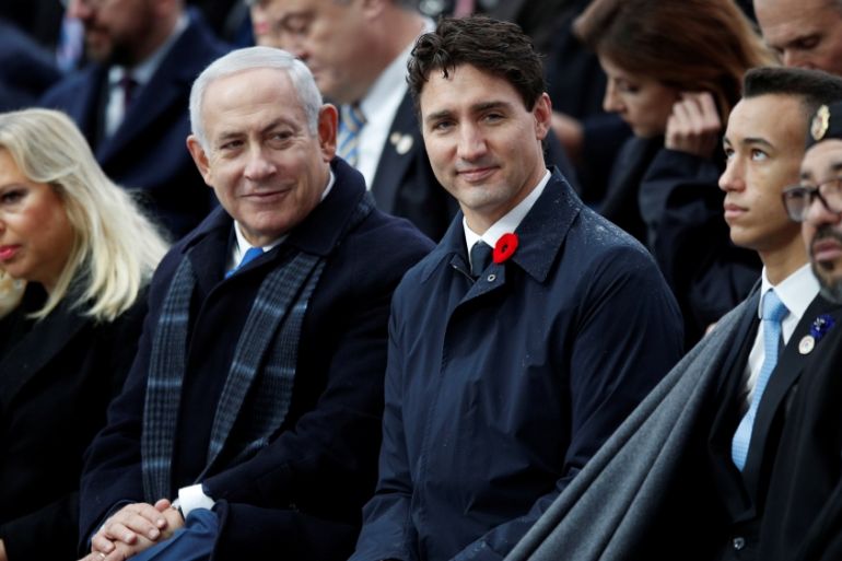 Israeli Prime Minister Benjamin Netanyahu, his wife Sara, Canadian Prime Minister Justin Trudeau, Moroccan King Mohammed VI, and Crown Prince Moulay Hassan attend a commemoration ceremony for Armistic