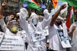Protest demanding better treatment for people infected with COVID-19 in Kolkata
