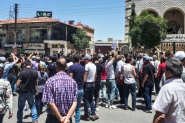 A handout picture released by the local news site Suwayda 24 shows Syrians chanting anti-government slogans as they protest the country''s deteriorating economic conditions and corruption, in the south