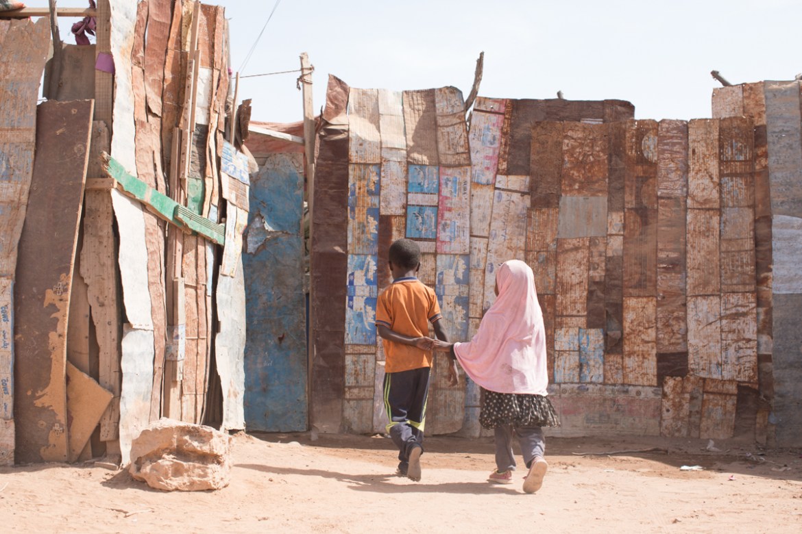 Two Ethiopian children outside their home in a shantytown in Burco, Somaliland. The informal settlement which has existed for several years, is home to dozens of Ethiopian migrants who had tried to ma