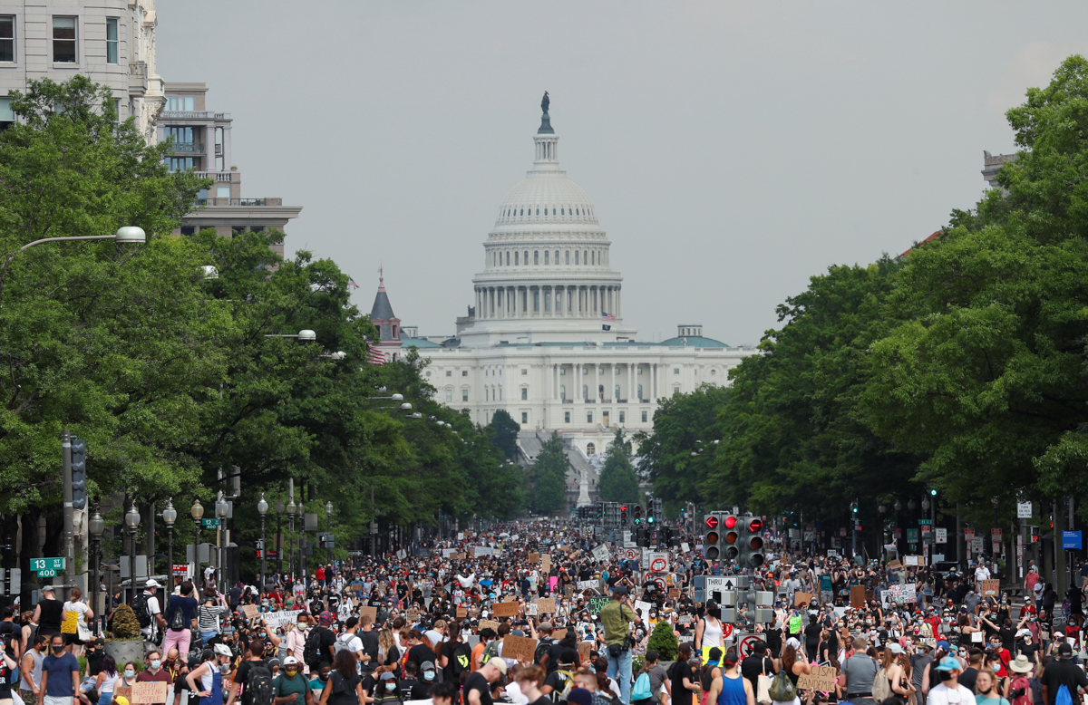 Demonstrators march from the U.S. Capitol Building during a protest against racial inequality in the aftermath of the death in Minneapolis police custody of George Floyd, in Washington, U.S., June 6, 