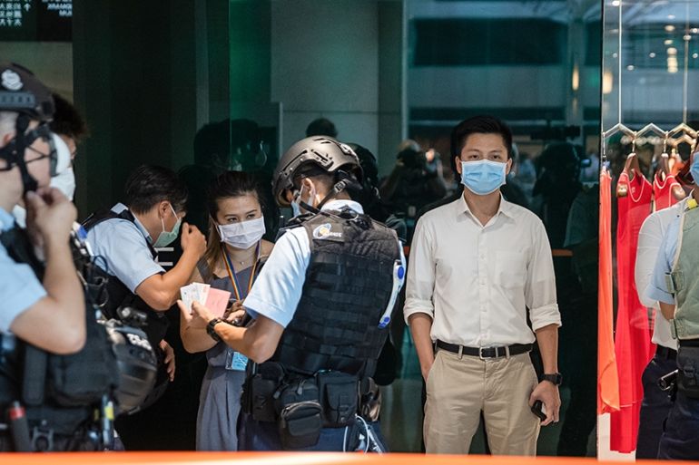 epa08517084 Police detain pro-democracy protesters during a ''lunch with you'' rally at a shopping mall in Hong Kong, China, 30 June 2020. China''s National People''s Congress Standing Committee has unani