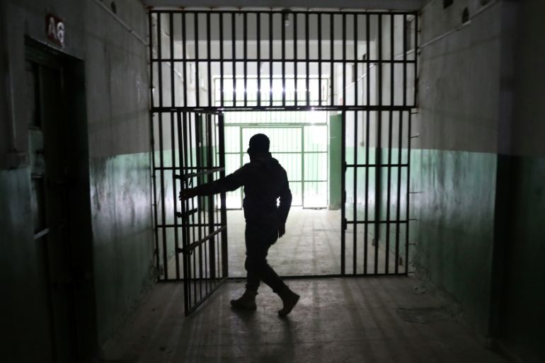 The Wider Image: Inside the prisons where remnants of Islamic State are held in limbo