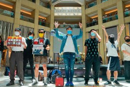 Protesters gather at a shopping mall in Central during a pro-democracy protest against Beijing''s national security law in Hong Kong, Tuesday, June 30, 2020. Hong Kong media are reporting that China ha