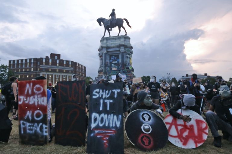 Confederate statue protest US AP photo