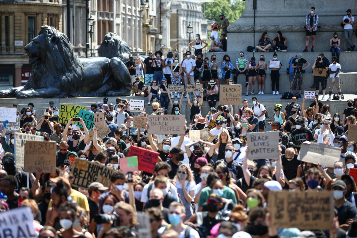 LONDON, ENGLAND - MAY 31: People hold placards as they join a spontaneous Black Lives Matter march at Trafalgar Square to protest the death of George Floyd in Minneapolis and in support of the demonst