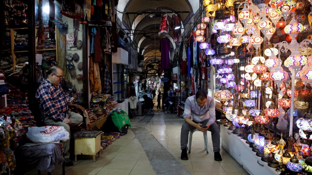 FILE PHOTO: Merchants are seen at Grand Bazaar as it reopens after weeks of the close doors amid the spread of the coronavirus disease (COVID-19), in Istanbul, Turkey, June 1, 2020