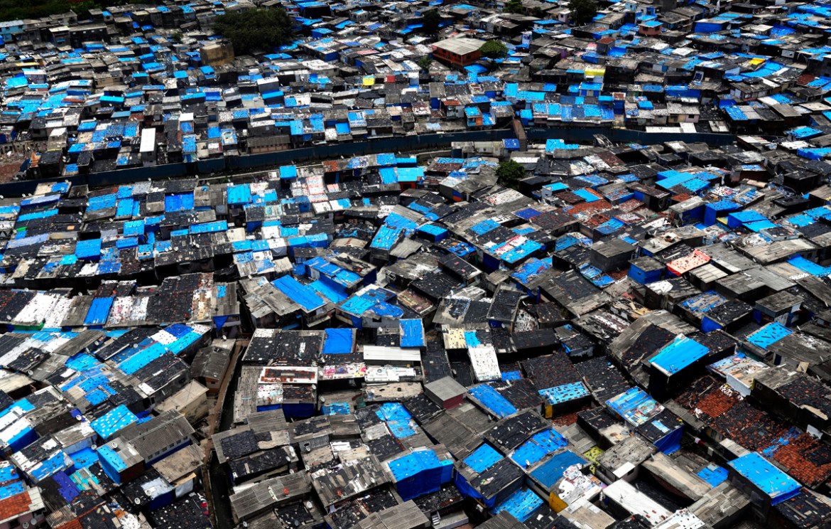 A general view of a slum area, some of which are containment zones, in Mumbai, India, Sunday, June 28, 2020. India is the fourth hardest-hit country by the COVID-19 pandemic in the world after the U.S