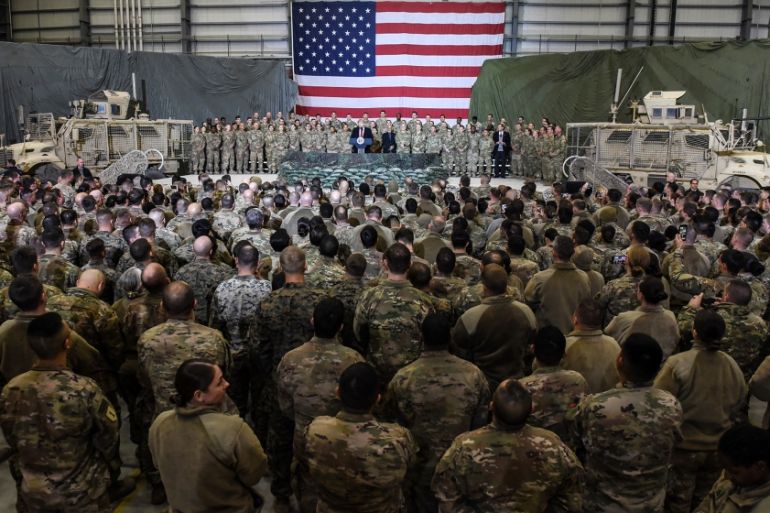 US President Donald Trump speaks to the troops during a surprise Thanksgiving day visit at Bagram Air Field, on November 28, 2019 in Afghanistan. Olivier Douliery / AFP
