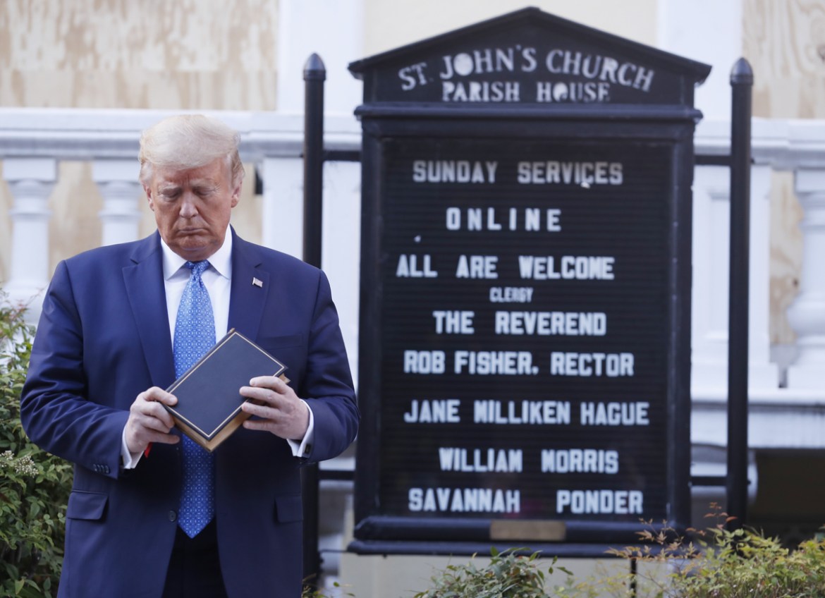 epa08459183 US President Donald J. Trump poses with a bible outside St. John''s Episcopal Church after delivering remarks in the Rose Garden at the White House in Washington, DC, USA, 01 June 2020. Tru