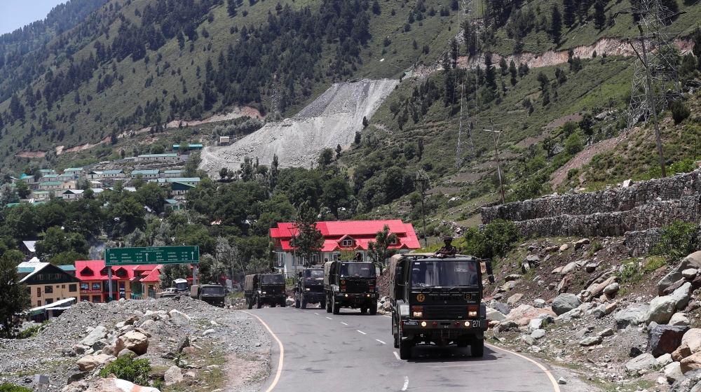 Indian army trucks move along a highway leading to Ladakh, at Gagangeer in Kashmir's Ganderbal district June 17, 2020. REUTERS/Danish Ismail
