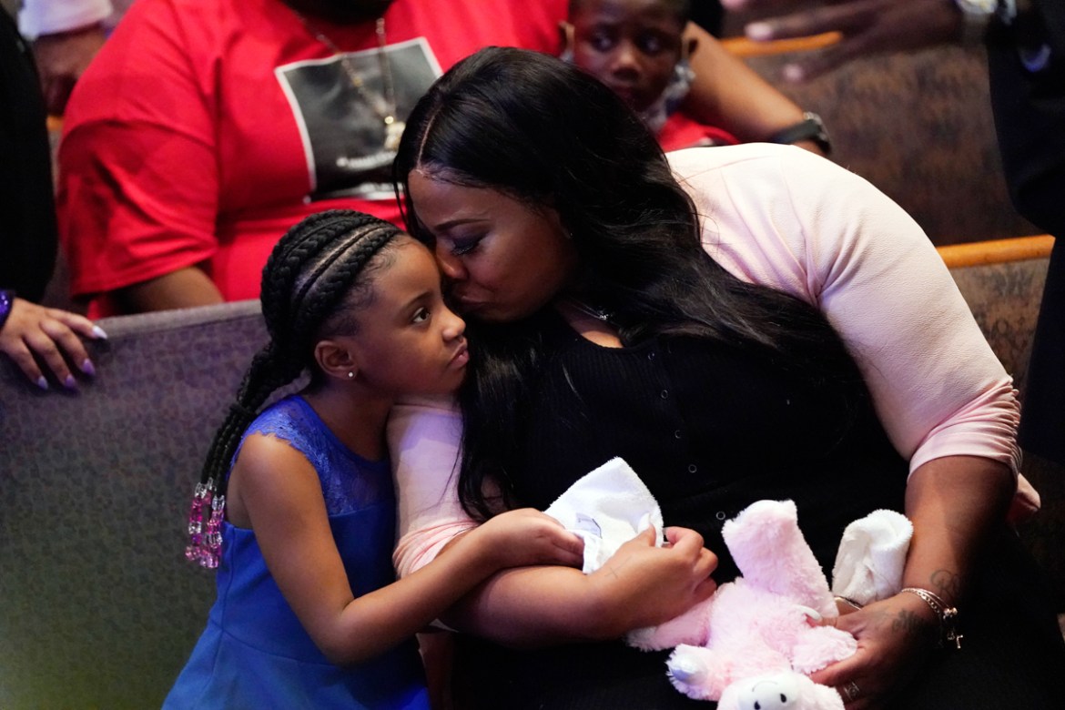 HOUSTON, TEXAS - JUNE 09: Roxie Washington (R) and Gianna Floyd, daughter of George Floyd, attend the funeral service in the chapel at the Fountain of Praise church June 9, 2020 in Houston, Texas. Geo