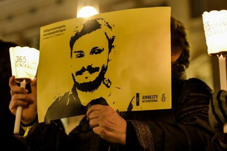 ITALY-EGYPT-AMNESTY-TORTURE-CRIME-DEMO-REGENI Activists of human rights organization Amnesty International hold a picture of G