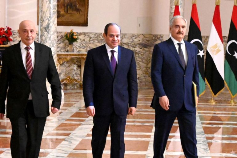 A handout picture released by the Egyptian Presidency on June 6, 2020 shows Egyptian President Abdel Fattah al-Sisi (C), Libyan commander Khalifa Haftar (R) and the Libyan Parliament speaker Aguila Sa