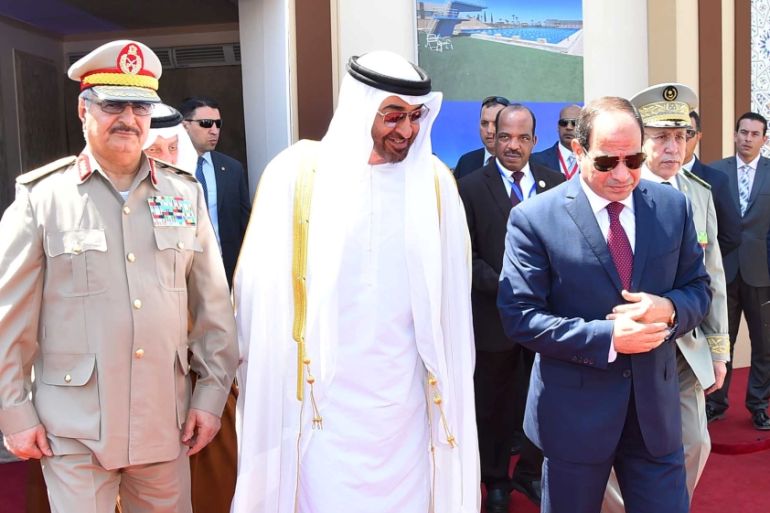 Egyptian President Abdel Fattah al-Sisi arrives with Arab leaders at the opening of the Mohamed Najib military base at El Hammam City in Egypt