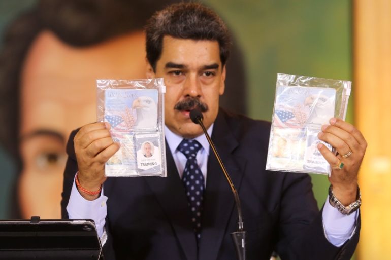 Personal documents are shown by Venezuela''s President Nicolas Maduro during a virtual news conference in Caracas