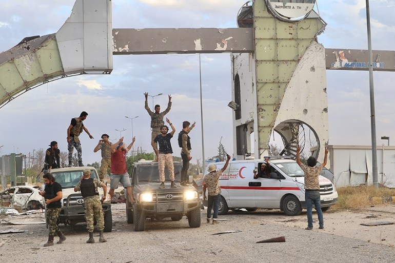 TRIPOLI, LIBYA - JUNE 03: Members of Libyan army celebrate after recapturing Tripoli airport from warlord Khalifa Haftar''s militias in Tripoli, Libya on June 03, 2020. ( Hazem Turkia - Anadolu Agency