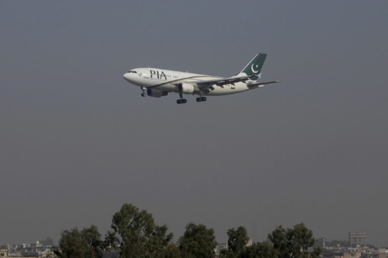 A Pakistan International Airlines (PIA) passenger plane arrives at the Benazir International airport in Islamabad, Pakistan, December 2, 2015. Employees of Pakistan''s ailing