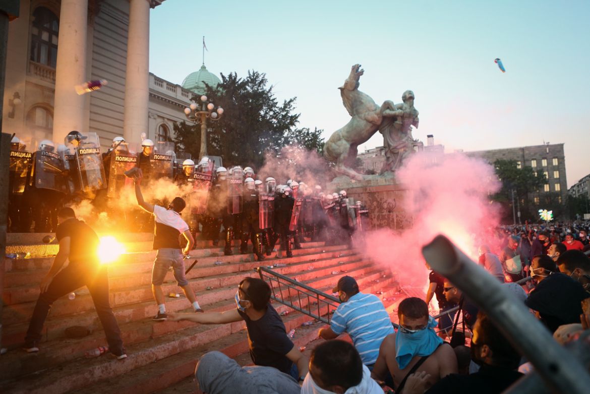 Protestors clash with police in Belgrade on July 8, 2020 as violence erupts against a weekend curfew announced to combat a resurgence of COVID-19 infections despite Serbia''s President Aleksandar Vucic