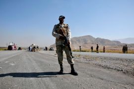 A dparamilitary soldier stands near the site of a bomb blast in the outskirts of Quetta September 23, 2011. Suspected militants detonated a remote-controlled bomb in southwestern
