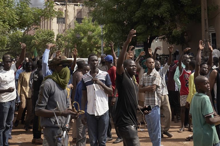 Protesters gather in front of the Salam mosque of Badalabougou, where the influent Imam Mahmoud Dicko led a prayer dedicated to the victims of the clashes of the past two days in Bamako on July 12, 20