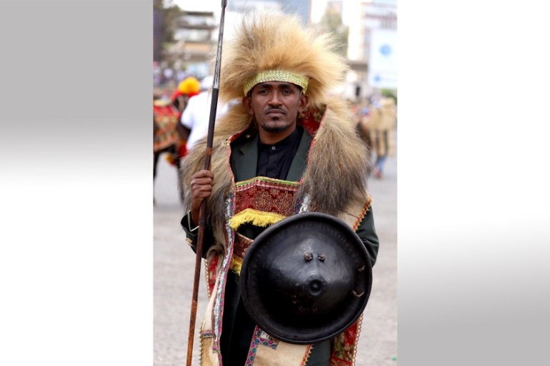 Ethiopian musician Haacaaluu Hundeessaa poses dressed in traditional costumes during the 123rd anniversary celebration of the battle of Adwa where the Ethiopian forces defeated an invading Italian for