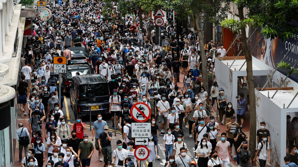Anti-national security law protesters march at the anniversary of Hong Kong's handover to China from Britain, in Hong Kong, China July 1, 2020. REUTERS/Tyrone Siu