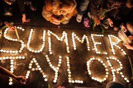 Protesters hold a vigil to honor Summer Taylor, who died after she was hit by a car during a recent protest, on July 5, 2020 in Seattle, Washington. A driver struck protesters early Saturday morning d