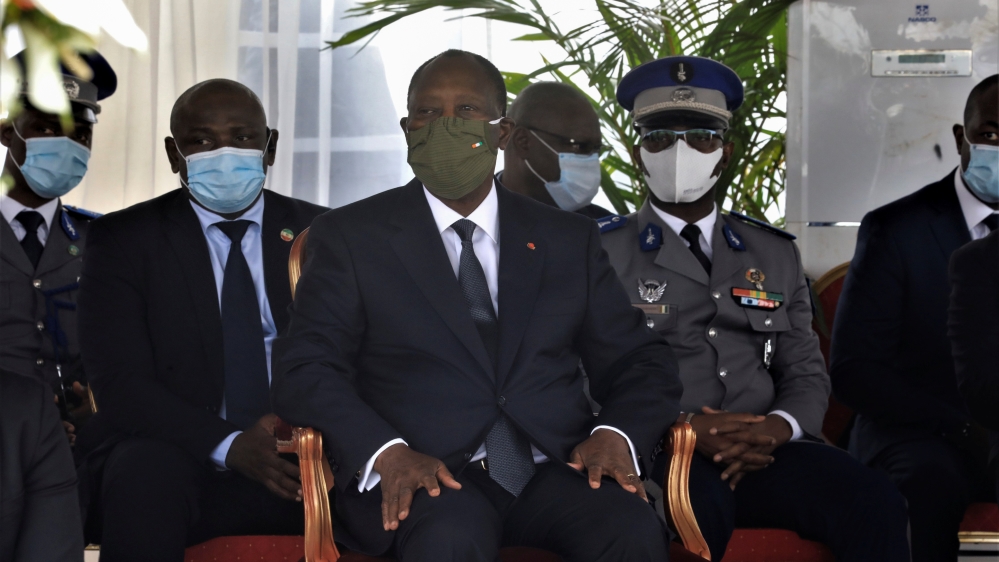 Ivory Coast President Alassane Ouattara attends a national tribute ceremony for dead soldiers, in Abidjan