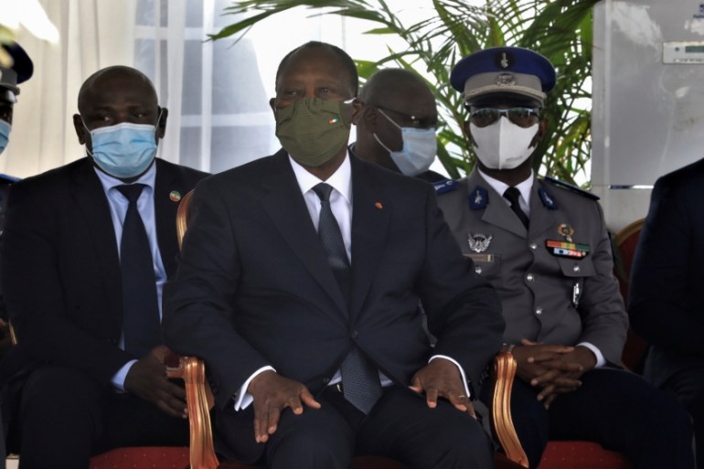 Ivory Coast President Alassane Ouattara attends a national tribute ceremony for dead soldiers, in Abidjan