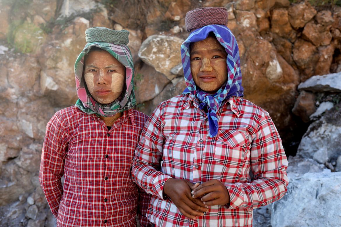 Mya Lay, 25, and one of her colleagues, both of whom work at a marble mine, pose for a photo at the marble mine where they work in Sagyin, Mandalay, Myanmar, October 19, 2019. "I was born in this vill