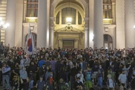 Protesters gather in front of the Serbian parliament in Belgrade,