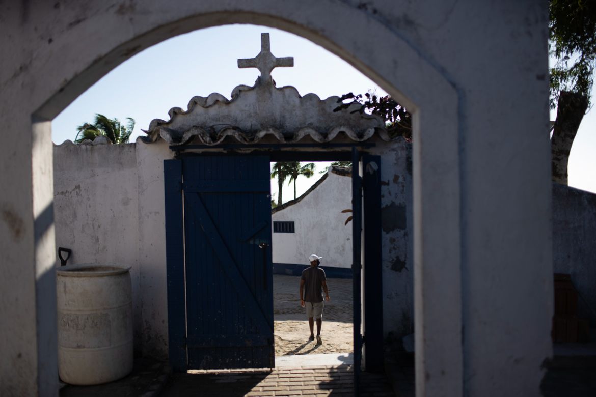 Eduardo Oliveira Costa leaves the Sant''Anna cemetery, where his mother Carivaldina Oliveira da Costa, also known as Aunt Uia, who died from COVID-19 related complications, was buried, in Buzios, Brazi