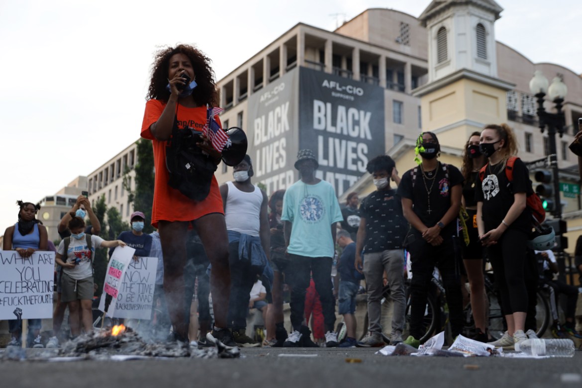 WASHINGTON, DC - JULY 04: An anti-Trump activist speaks at Black Lives Matter Plaza near the White House July 4, 2020 in Washington, DC. Anti-Trump activists rallied on Independence Day to voice their