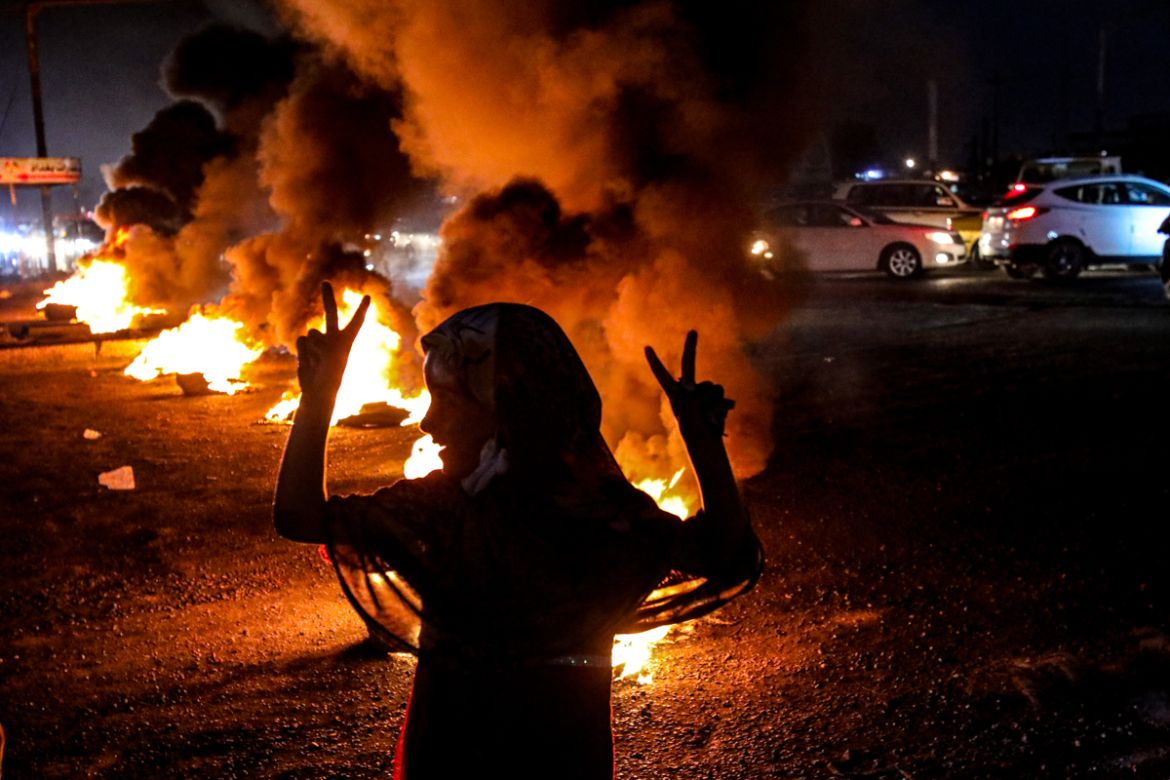 Protesters burn tires during a demonstration demanding better public services and jobs in Basra, southeast of Baghdad, Iraq, Monday, July 27, 2020. (AP Photo/Nabil al-Jurani)