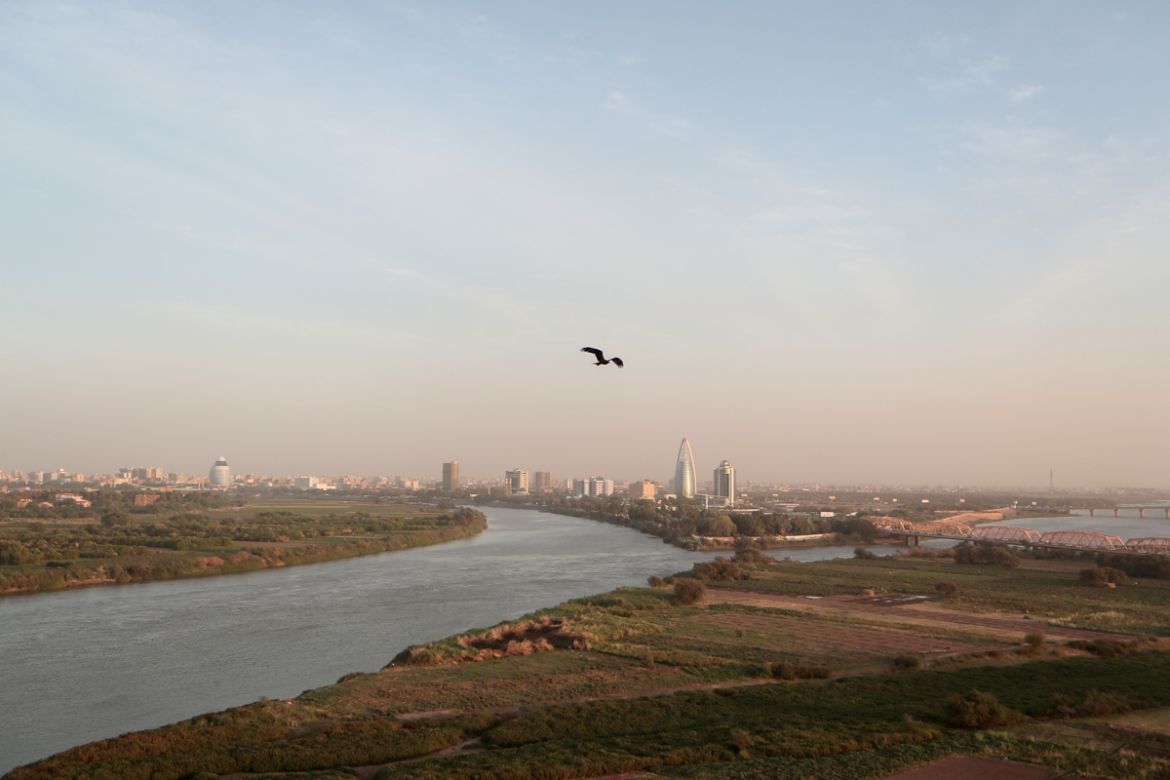 A bird flies over the convergence between the White Nile river and Blue Nile river in Khartoum, Sudan, February 17, 2020. REUTERS/Zohra Bensemra SEARCH "BENSEMRA NILE" FOR THIS STORY. SEARCH "WIDE