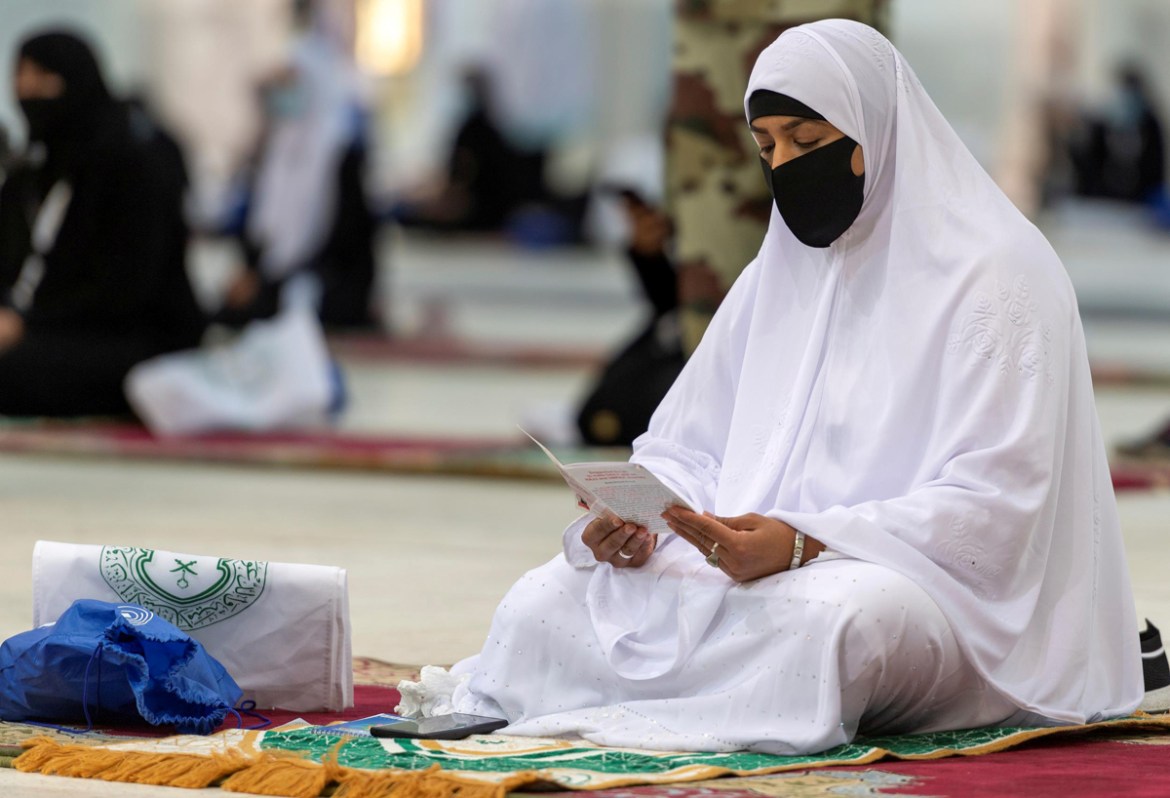 A Muslim pilgrim wearing a protective mask, prays inside Namira Mosque in Arafat to mark Haj''s most important day, Day of Arafat, during her Haj pilgrimage amid the coronavirus disease (COVID-19) pand