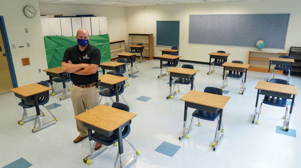 Desks are spaced to prevent the spread of the coronavirus disease (COVID-19) in a classroom in Virginia