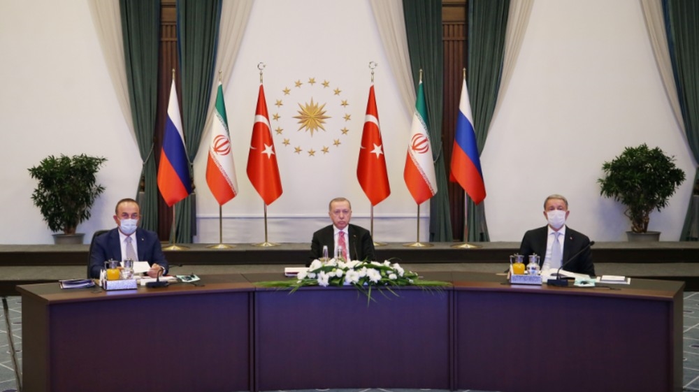Turkish President Tayyip Erdogan attends a video conference call, dedicated to the conflict in Syria, with Russia's President Vladimir Putin and Iran's President Hassan Rouhani