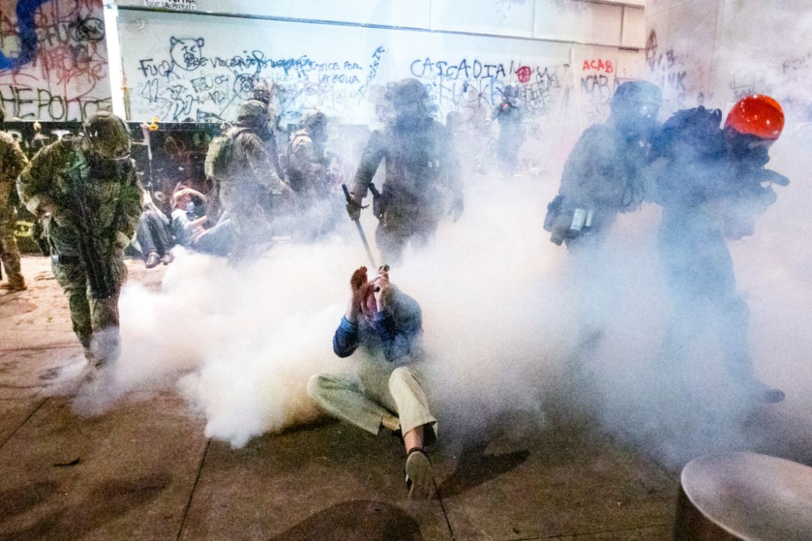 Federal officers use chemical irritants and crowd control munitions to disperse Black Lives Matter protesters outside the Mark O. Hatfield United States Courthouse on Wednesday, July 22, 2020, in Port
