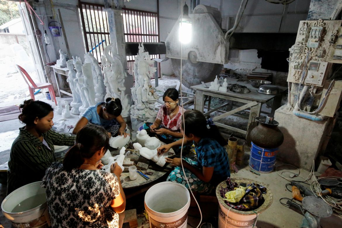 Women who work at a marble workshop, polish marble statues in Sagyin, Mandalay, Myanmar, October 19, 2019. REUTERS/Ann Wang SEARCH "SAGYIN MARBLE" FOR THIS STORY. SEARCH "WIDER IMAGE" FOR ALL STOR