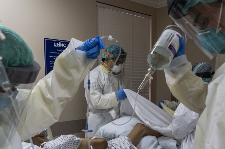 HOUSTON, TX - JULY 2: (EDITORIAL USE ONLY) Members of the medical staff treat a patient in the COVID-19 intensive care unit at the United Memorial Medical Center on July 2, 2020 in Houston, Texas. COV