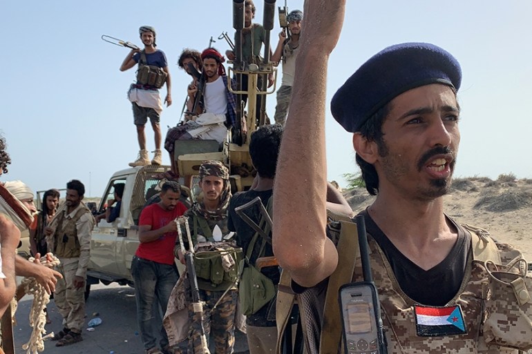 Fighters loyal to Yemen''s Southern Transitional Council (STC) separatists gather at the frontline during clashes with pro-government forces for control of Zinjibar, the capital of the southern Abyan p